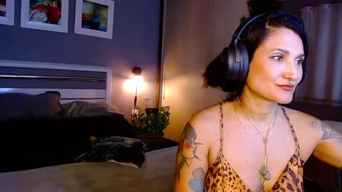 My alter ego Betinna Flowers - a tattooed Miss  -   Are you missing me come in here  -  online show from 26, 2, 2025